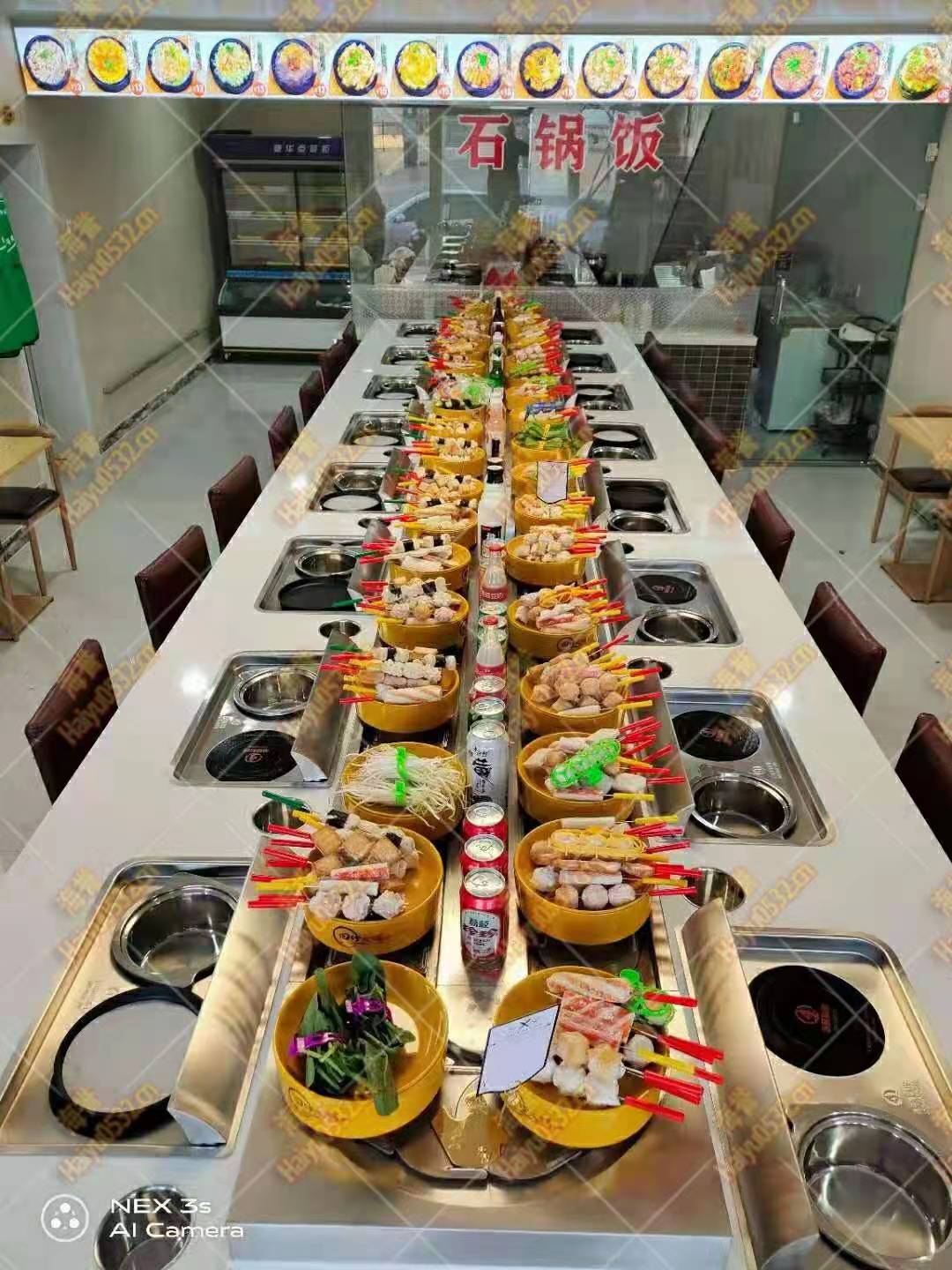 旋轉(zhuǎn)小火鍋機器多少錢一臺